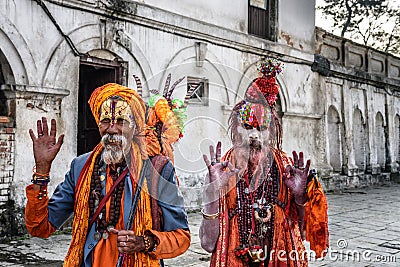 Shaiva sadhus (holy men) in ancient Pashupatinath Temple Editorial Stock Photo