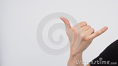 The shaka hand sign is a greeting in the hawaiian culture,subsequently aiso used in surfer culture Stock Photo