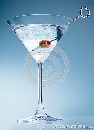 Shaken martini cocktail with olive Stock Photo
