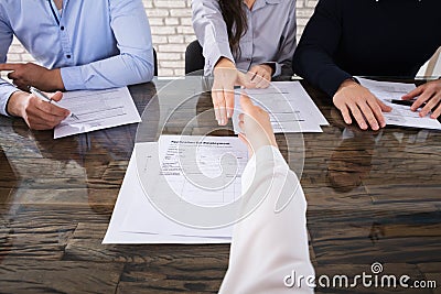 Shaking Hand With Corporate Recruitment Officers Stock Photo