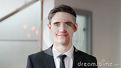 Shaking Head to Agree, Young Businessman in Office Stock Photo