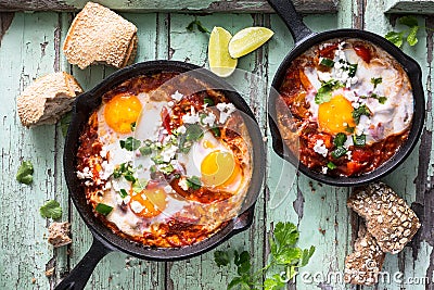 Shakshuka, Fried Eggs with Tomatoe sauce Stock Photo