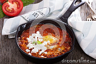 Shakshuka with tomatoes and eggs Stock Photo