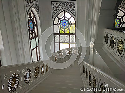 Shali, Chechnya, Russia - August 17, 2022: Mosque Pride of Muslims made of white marble in the city of Shali. There are stained- Editorial Stock Photo