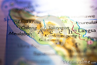 Shallow depth of field focus on geographical map location of Aceh city in Sumatra island Indonesia Asia continent on atlas Stock Photo