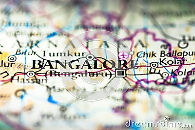 Shallow depth of field focus on geographical map location of Bangalore Bengaluru city in Karnataka India Asia continent on atlas Stock Photo