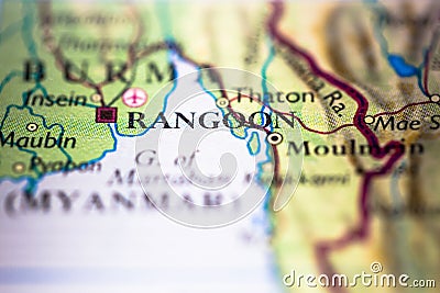Shallow depth of field focus on geographical map location of Rangoon, Yangon city in Bruma Myanmar Indochina Asia continent on atl Stock Photo