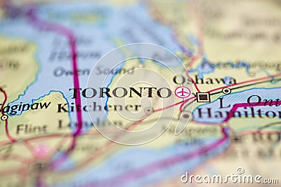 Shallow depth of field focus on geographical map location of Toronto city Canada America continent on atlas Stock Photo