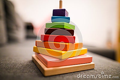 Shallow depth of field selective focus image with details of colorful wood blocks toy for children Stock Photo