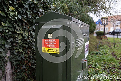 Shallow focus of an Internet Broadband telecoms cabinet in a rural location. Editorial Stock Photo