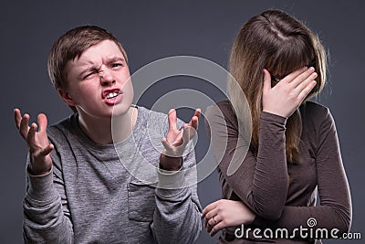 Shame young woman and man Stock Photo