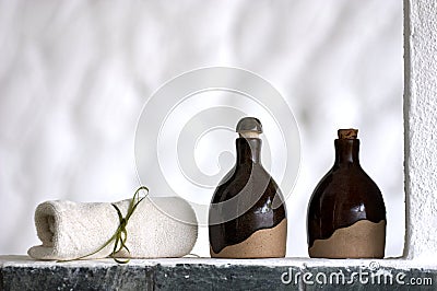 Shampoo, body lotion and towel Stock Photo