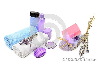 Shampoo and soap with lavender extract, scented candles and bath towels isolated on white . Collage Stock Photo