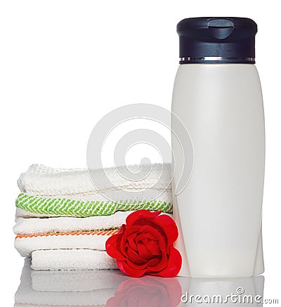 Shampoo and towel with red soap rose Stock Photo