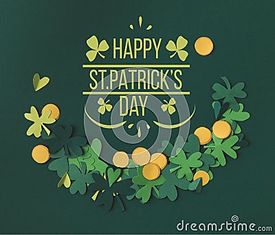 Shamrocks and coins with happy st patricks day lettering Stock Photo