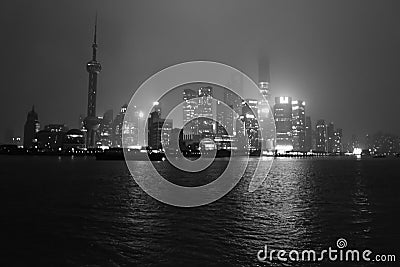 Nightscape of the bund with the fog or mist cover the bund in the winter season,shanghai china,black white tone Editorial Stock Photo