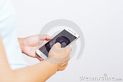 SHANGHAI, CHINA - MAY, 2018 : Women hand using smartphone with icons of social media on screen, smartphone life style Editorial Stock Photo