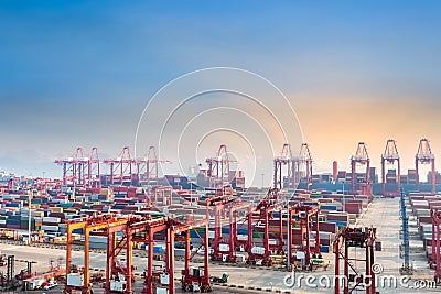 Shanghai container terminal at dusk Stock Photo