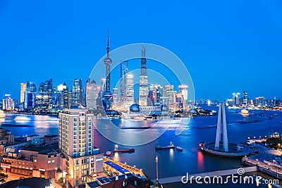 Shanghai skyline and huangpu river in nightfall Stock Photo