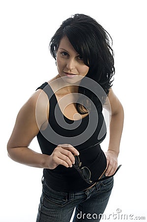 Shapely pretty young woman smiling with attitude Stock Photo