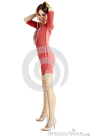 Shapely woman adjust hair Stock Photo