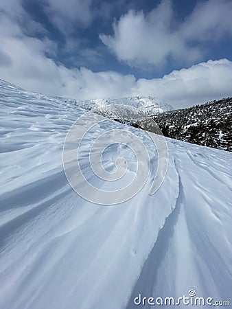 Shapes, patterns and formations formed by the effect of the storm on high mountains Stock Photo