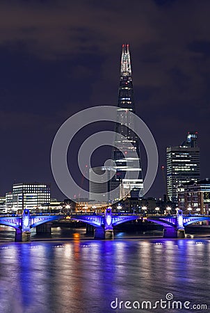 The Shard and Southwark Bridge in London Editorial Stock Photo