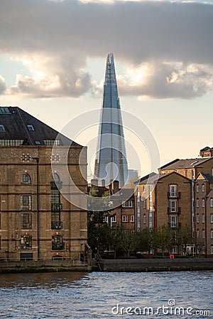 The Shard between warehouses and modern apartments Editorial Stock Photo