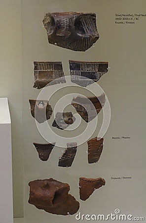 Shards or fragments of Neolithic stone jars from the island of Mochlos: Heraklion Archaeological Museum exhibit from 6000 BCE to Editorial Stock Photo