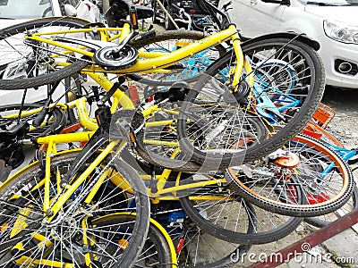 Shared bikes are stacked in a pile Editorial Stock Photo