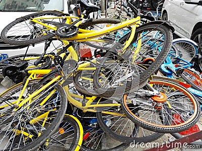 Shared bikes are stacked in a pile Editorial Stock Photo