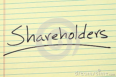 Shareholders On A Yellow Legal Pad Stock Photo