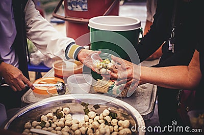 Sharing warm food for homeless and homeless people Stock Photo