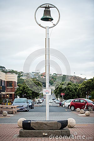 Shark Warning Bell sign and Bell Ringer Stock Photo