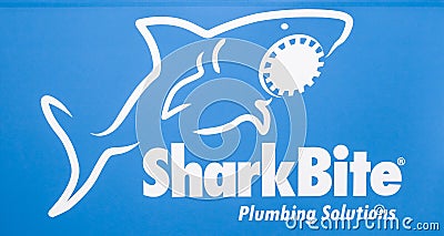 SharkBite company logo. Printed sticker letters Editorial Stock Photo