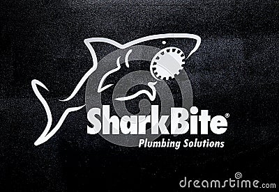 SharkBite company logo. Printed sticker letters Editorial Stock Photo