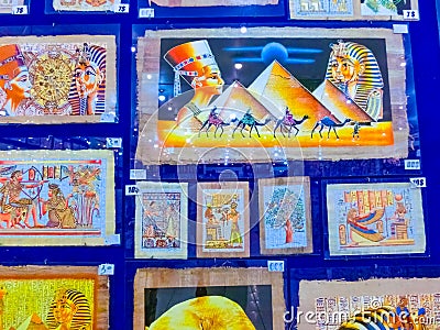 Sharm El Sheikh, Egypt - February 17, 2020: The papyrus with elements of egyptian history - objects displayed in shop in the Editorial Stock Photo