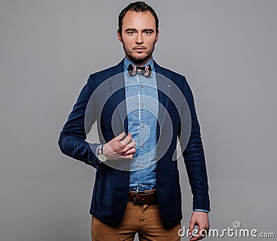 Sharp dressed fashionist wearing jacket Stock Photo