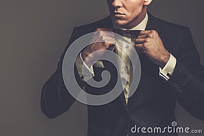 Sharp dressed fashionist wearing suit Stock Photo