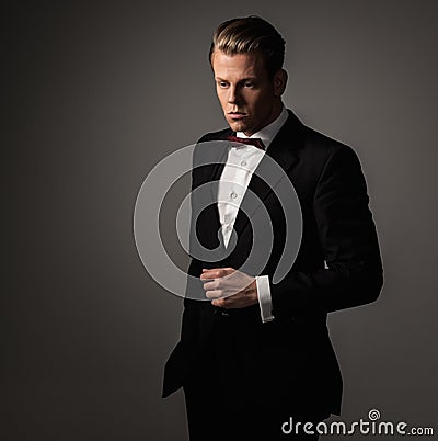 Sharp dressed fashionist wearing suit Stock Photo