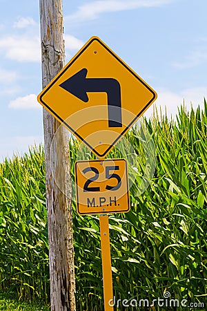 Sharp Left Turn Arrow Sign Stock Photo