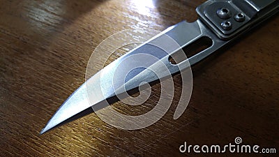 Sharp pocket knife in light Stock Photo