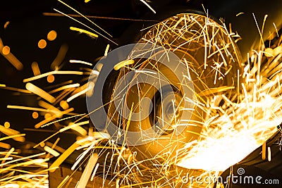 Sharpening and cutting of iron by abrasive disk Stock Photo