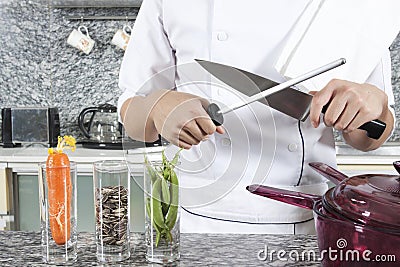 Sharpening a knife Stock Photo