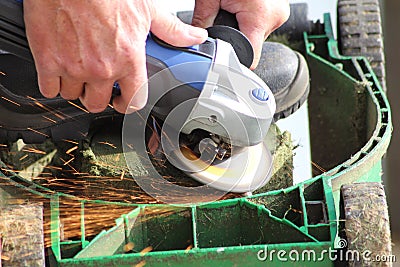 Sharpening a lawnmower blade Stock Photo