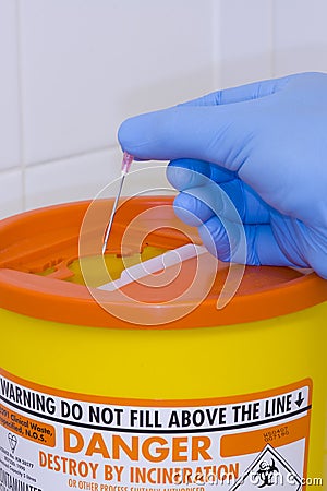 Sharps container needle disposal Stock Photo