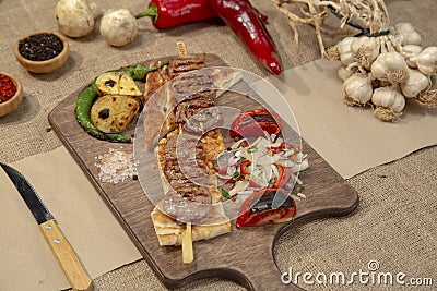 Grilled or barbecued shaslik Kebab chopstick stock photo Stock Photo