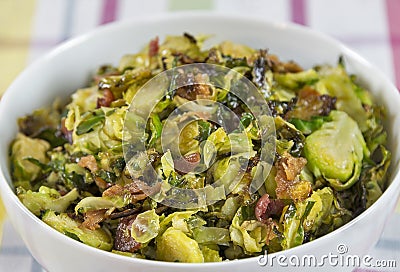 Shaved roasted brussels sprouts with crumbled bacon Stock Photo