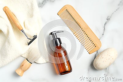 Shaving accessories for man on marble background. Flat lay composition with white towel, handmade soap, razor, shaving brush, Stock Photo