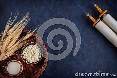 Shavuot is a traditional religious Jewish holiday on torah scroll Stock Photo